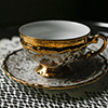 Ornate tea cup and saucer
